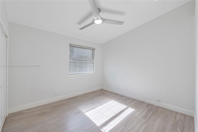 spare room featuring ceiling fan and light wood-type flooring