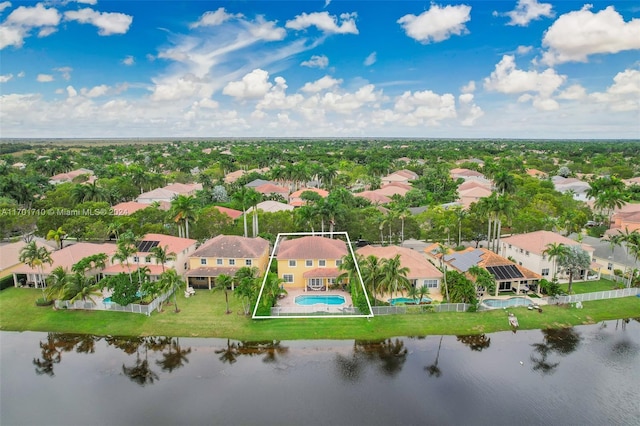 bird's eye view with a water view