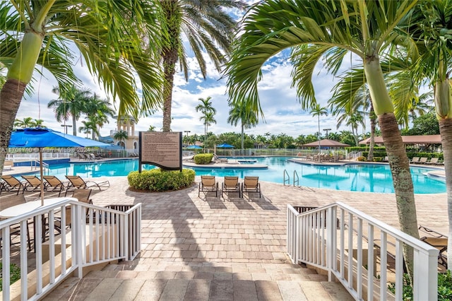 view of swimming pool featuring a patio area