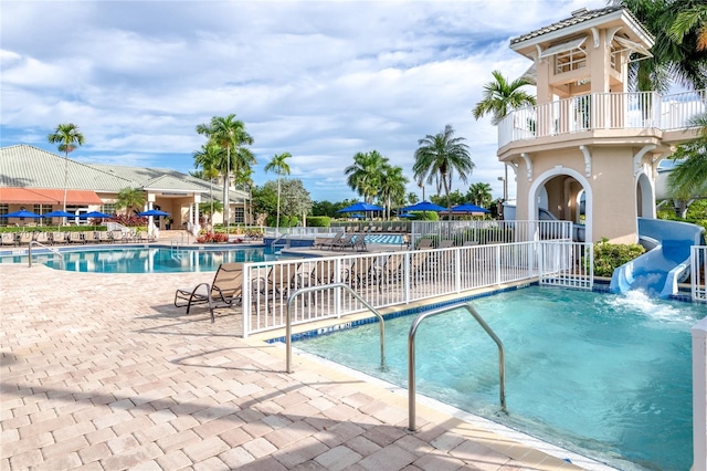 view of swimming pool featuring a patio