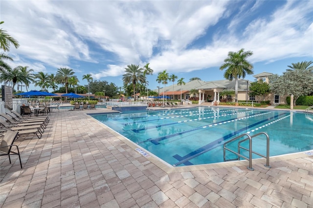 view of pool featuring a patio area