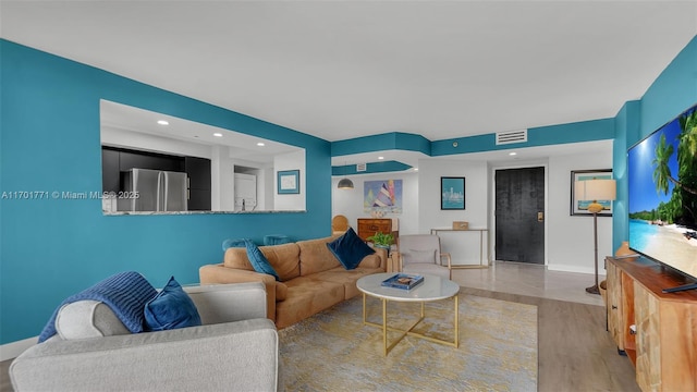 living room featuring light hardwood / wood-style flooring