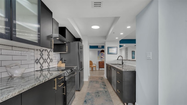 kitchen featuring sink, electric range oven, stainless steel dishwasher, light stone countertops, and decorative backsplash