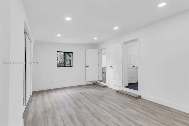 unfurnished bedroom with light hardwood / wood-style floors