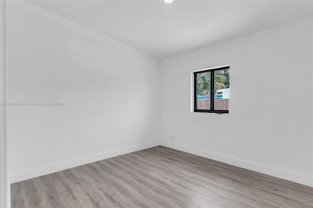 unfurnished room featuring light wood-type flooring