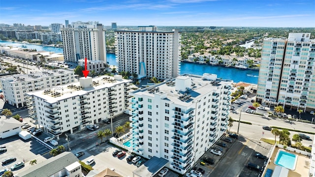 birds eye view of property featuring a water view