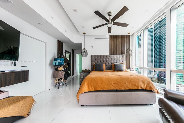 tiled bedroom with ceiling fan