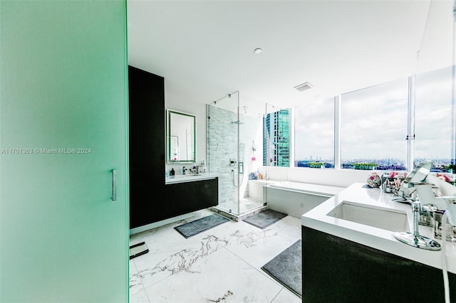 bathroom featuring vanity and plus walk in shower