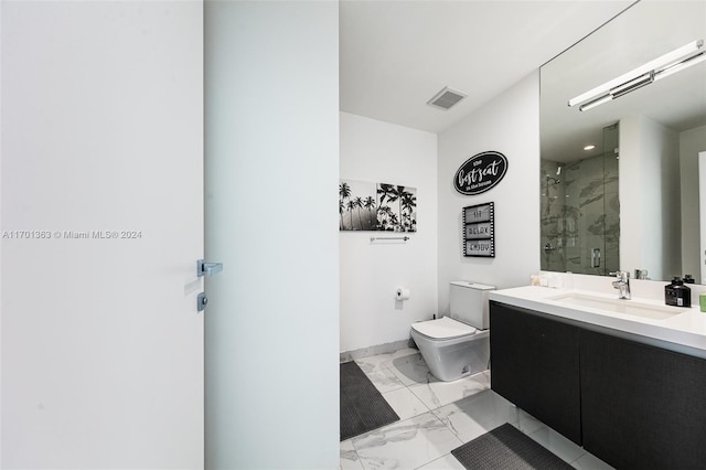 bathroom with vanity, toilet, and an enclosed shower