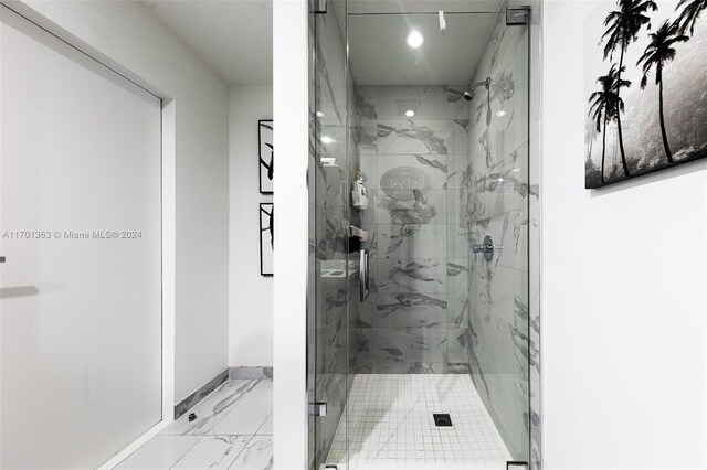 bathroom featuring an enclosed shower