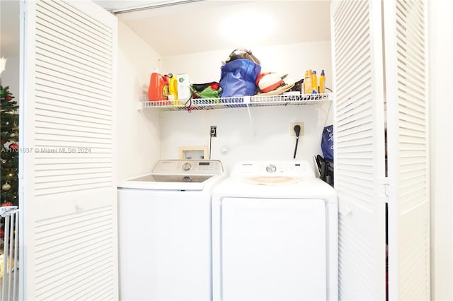 laundry room with separate washer and dryer