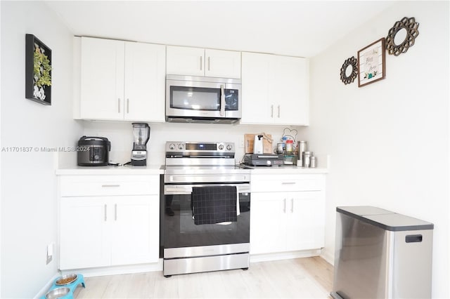 kitchen with white cabinets and stainless steel appliances