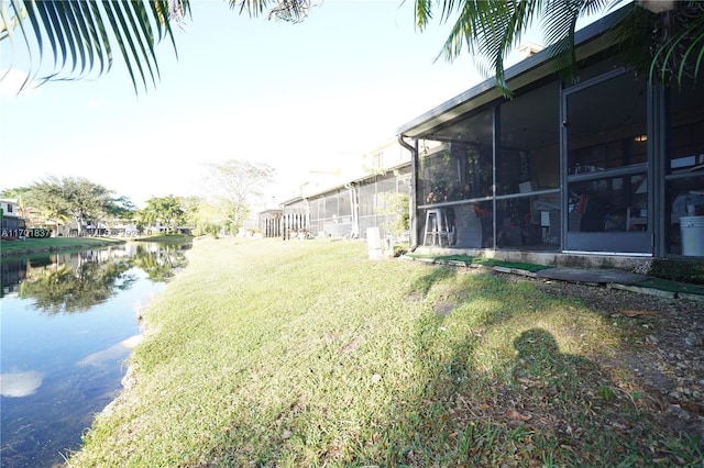 view of yard with a water view