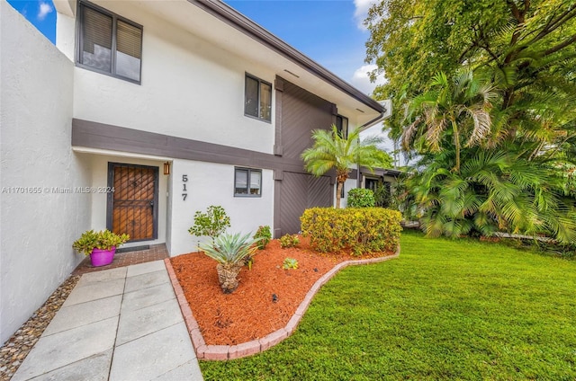 exterior space featuring a front yard