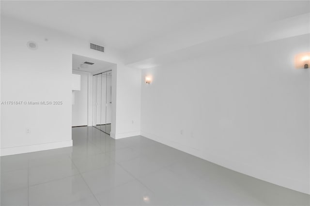 view of tiled spare room
