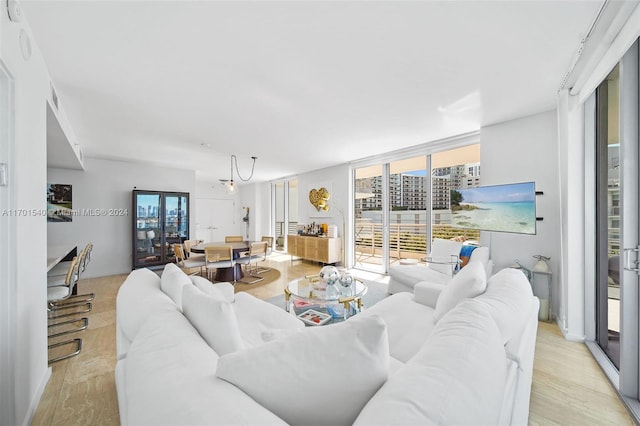 1445 16th St Unit 602, Miami Beach, FL 33139 - living area with light wood-style flooring