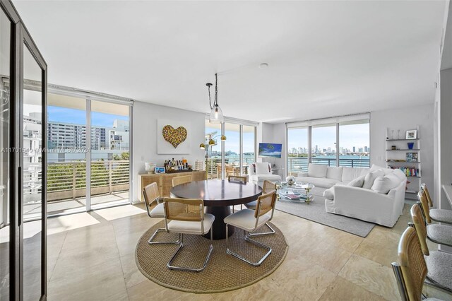 dining room featuring a wall of windows