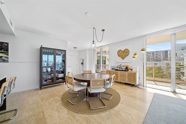 1445 16th St Unit 602, Miami Beach, FL 33139 - dining space featuring plenty of natural light and expansive windows