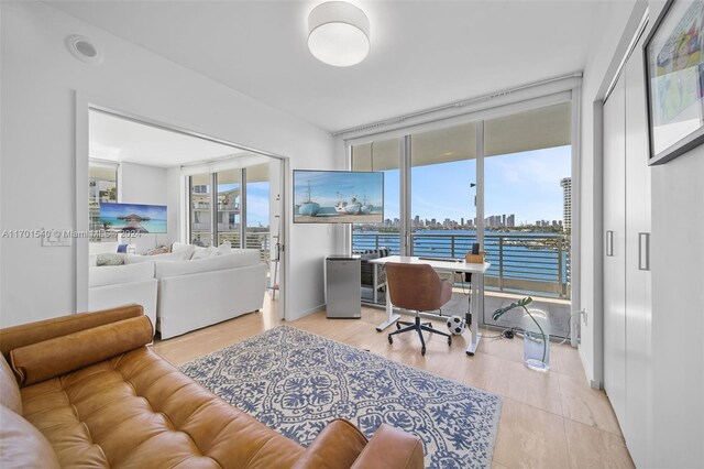 1445 16th St Unit 602, Miami Beach, FL 33139 - home office featuring expansive windows and wood finished floors