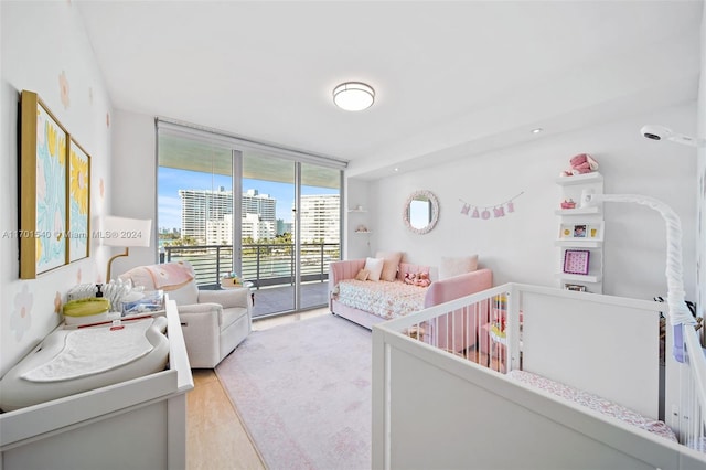 1445 16th St Unit 602, Miami Beach, FL 33139 - bedroom with a wall of windows, a view of city, and access to exterior