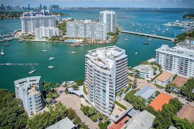 birds eye view of property featuring a water view