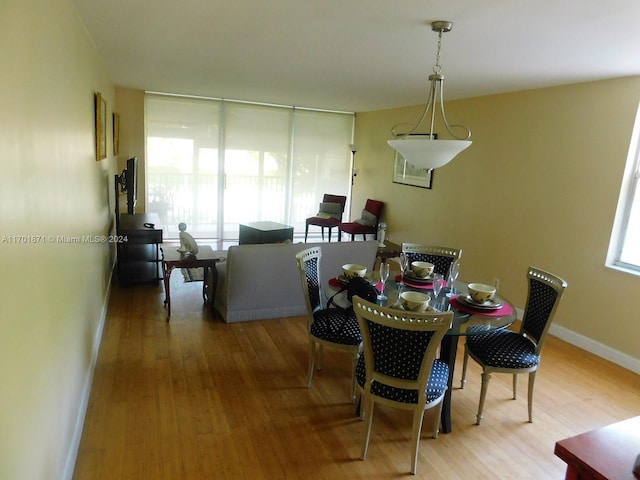 dining room featuring hardwood / wood-style flooring