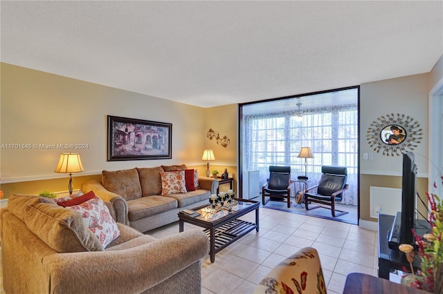 living room featuring light tile patterned flooring