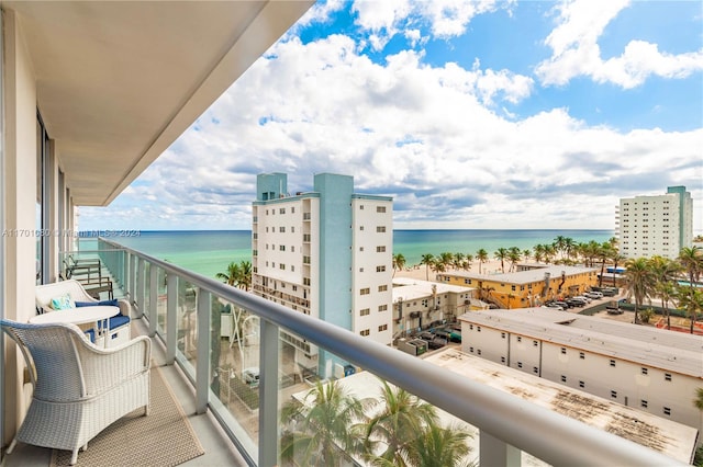 balcony featuring a water view