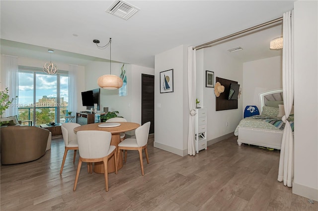 dining room featuring light hardwood / wood-style floors