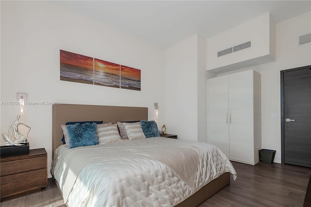 bedroom featuring dark hardwood / wood-style floors