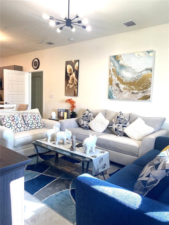 living room featuring a notable chandelier