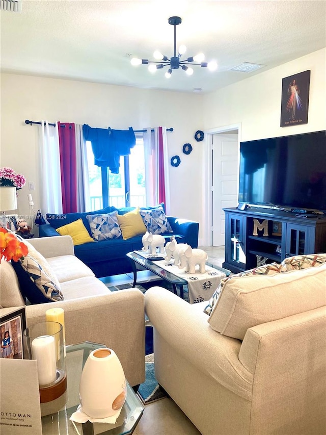 living room with a chandelier