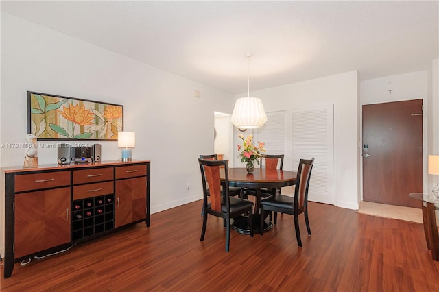 dining room featuring dark hardwood / wood-style floors