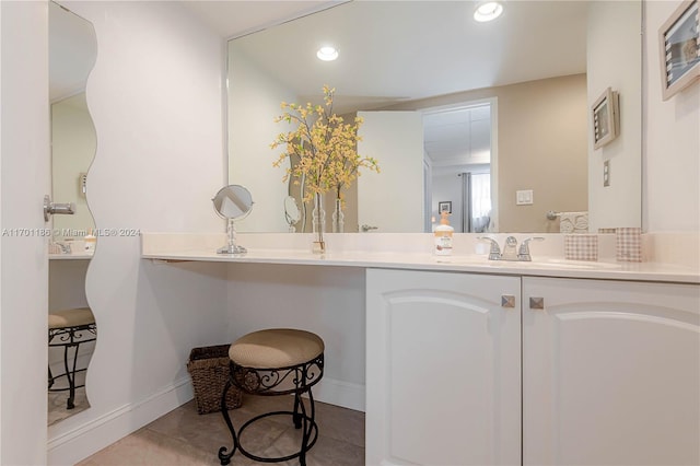 bathroom featuring tile patterned floors and vanity