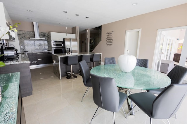 view of tiled dining space