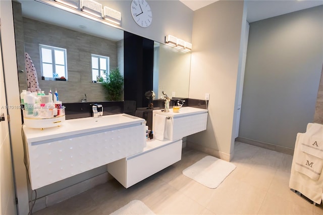 bathroom with tile patterned flooring and vanity