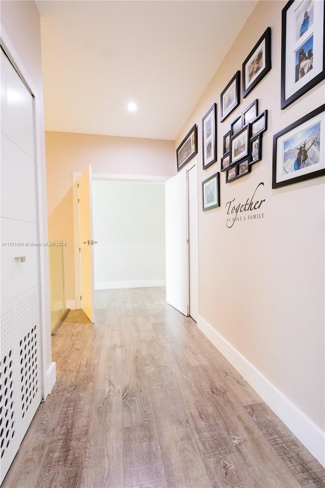 hallway featuring light hardwood / wood-style flooring