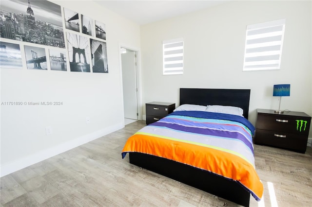 bedroom featuring hardwood / wood-style flooring