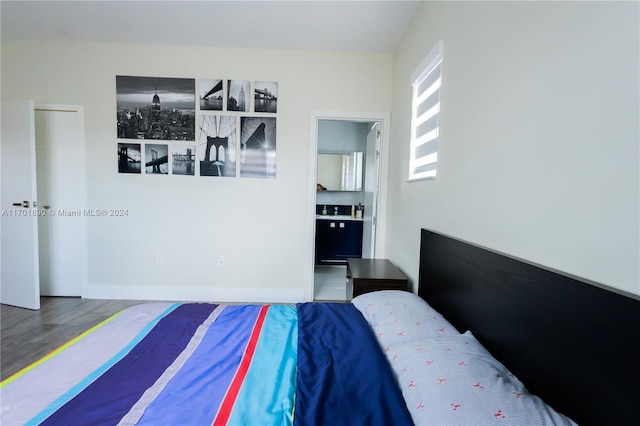 bedroom featuring hardwood / wood-style floors