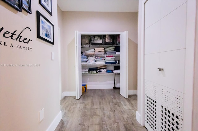 hallway featuring light hardwood / wood-style floors