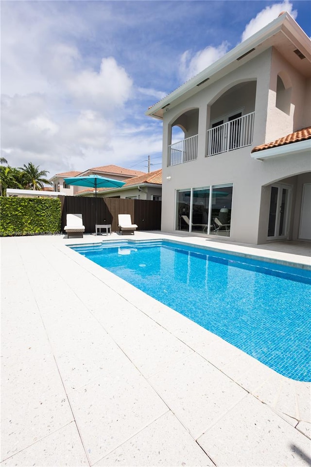 view of pool with a patio area