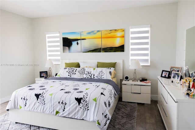 bedroom featuring dark hardwood / wood-style floors