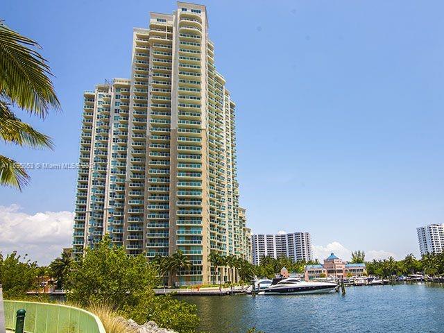 view of building exterior featuring a water view