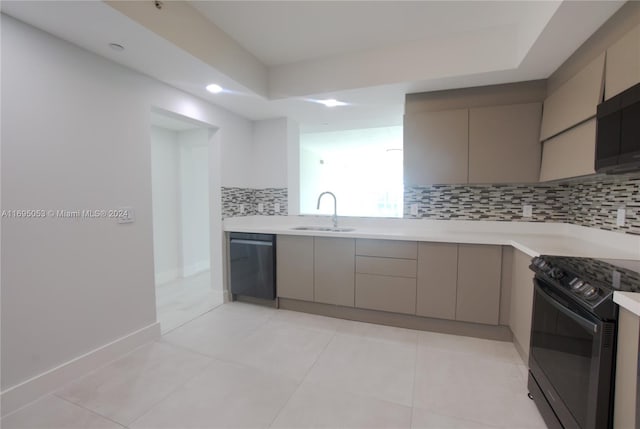 kitchen with gray cabinetry, sink, tasteful backsplash, black electric range, and stainless steel dishwasher