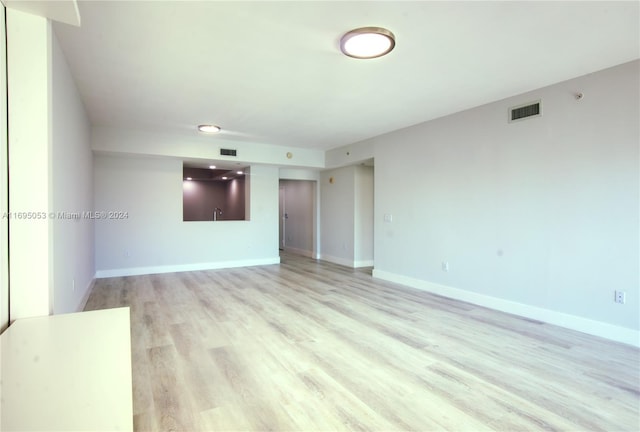 empty room featuring light hardwood / wood-style floors