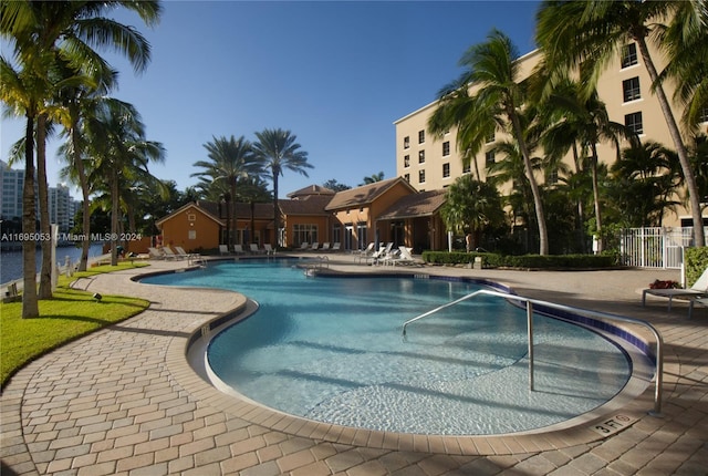 view of swimming pool with a patio area