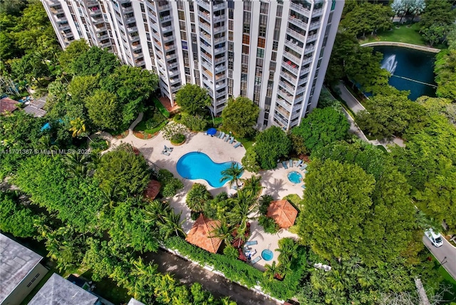 birds eye view of property with a water view