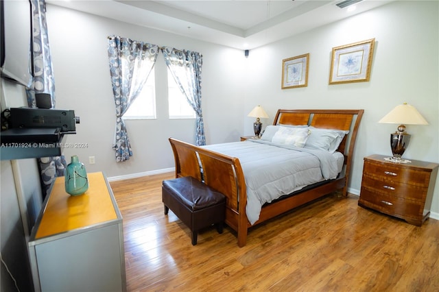 bedroom featuring light hardwood / wood-style floors