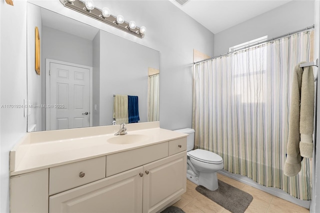 full bathroom featuring tile patterned flooring, vanity, shower / bathtub combination with curtain, and toilet