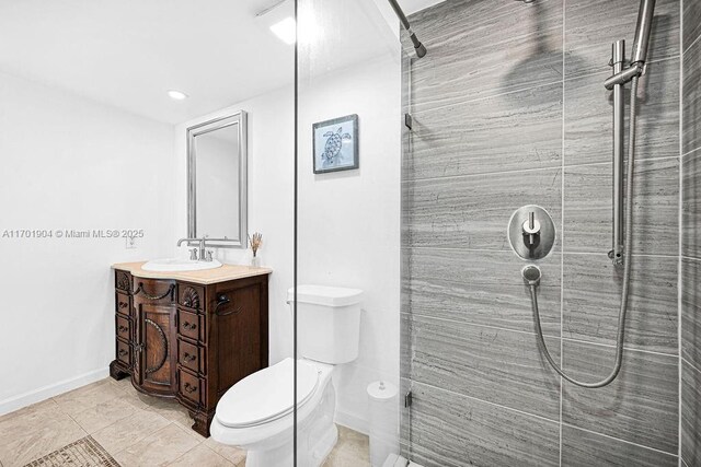 tiled bedroom featuring ensuite bathroom, a closet, and crown molding